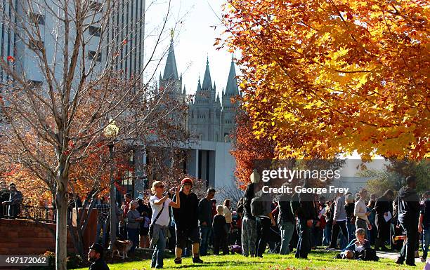 Protesters gather in City Creek Park where many submitted their resignations from the Church of Jesus Christ of Latter-Day Saints in response to a...