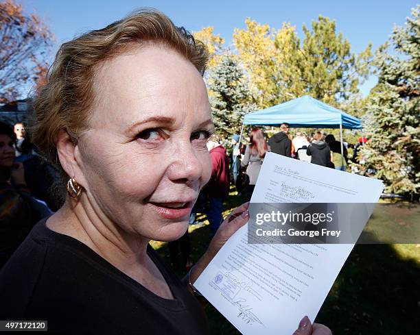 Patricia Peterson hold her letter of resignations from the Church of Jesus Christ of Latter-Day Saints in response to a recent change in church...