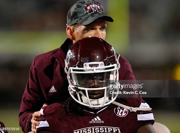 De'Runnya Wilson of the Mississippi State Bulldogs is carted off the field after an injury during the fourth quarter against the Alabama Crimson Tide...