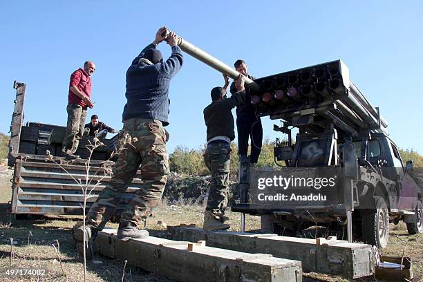 Forces belong to Syrian opposition group Ahrar ash-Sham prepare grad missiles before attacking regime controlled Cub el Ahmar region in Latakia,...