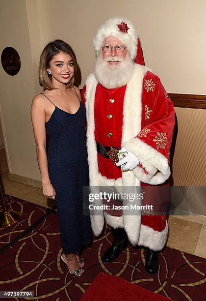 Actress Sarah Hyland and Santa Claus attend The Grove Christmas with Seth MacFarlane at The Grove on November 14, 2015 in Los Angeles, California.