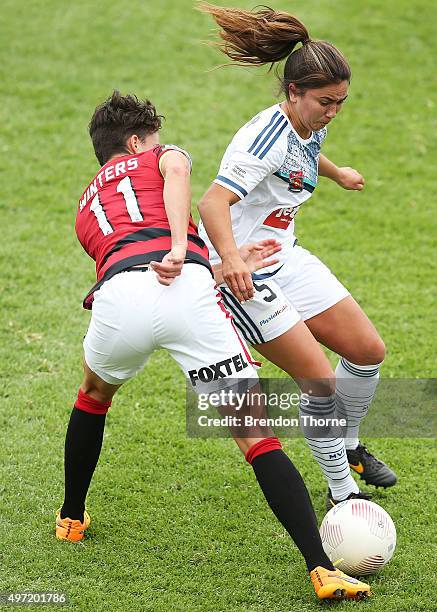 Briar Palmer of the Victory competes with Keelin Winters of the Wanderers during the round five W-League match between the Western Sydney Wanderers...