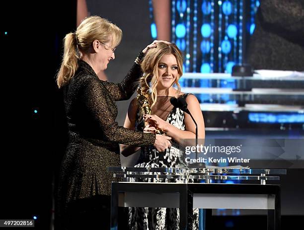 Actress Meryl Streep presents the Jean Hersholt Humanitarian Award to Billie Lourd, on behalf of her grandmother Debbie Reynolds, during the Academy...