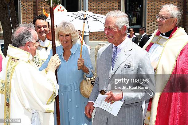 Prince Charles, Prince of Wales and Camilla, Duchess of Cornwall speak with members of the clergy after attending a service at St George's Cathedral...