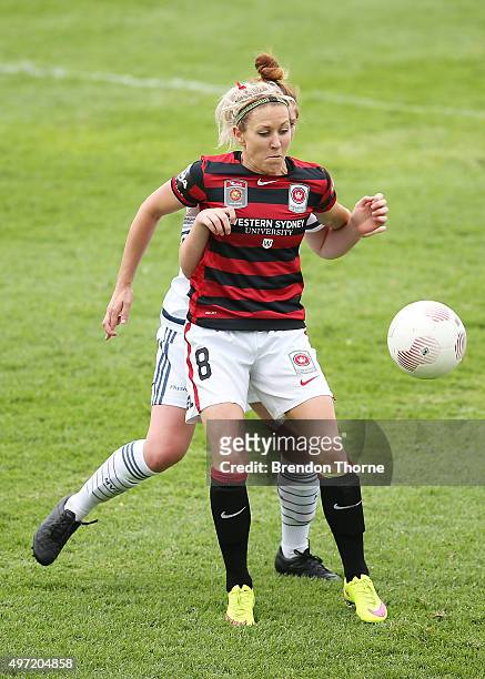 Erica Halloway of the Wanderers competes with Annabel Martin of the Victory during the round five W-League match between the Western Sydney Wanderers...