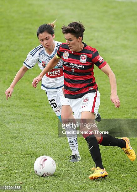 Keelin Winters of the Wanderers competes with Enza Barilla of the Victory during the round five W-League match between the Western Sydney Wanderers...