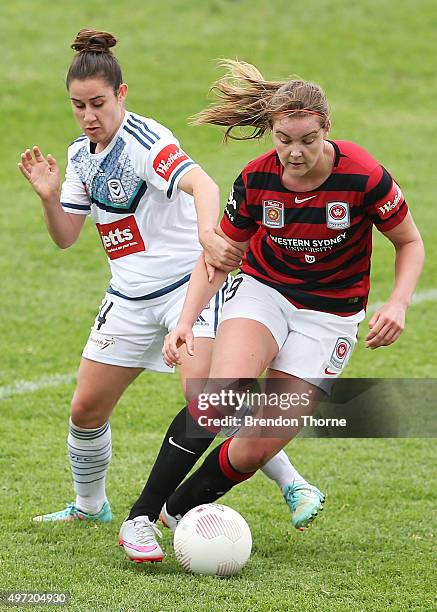 Elizabeth Grey of the Wanderers competes with Melissa Taranto of the Victory during the round five W-League match between the Western Sydney...
