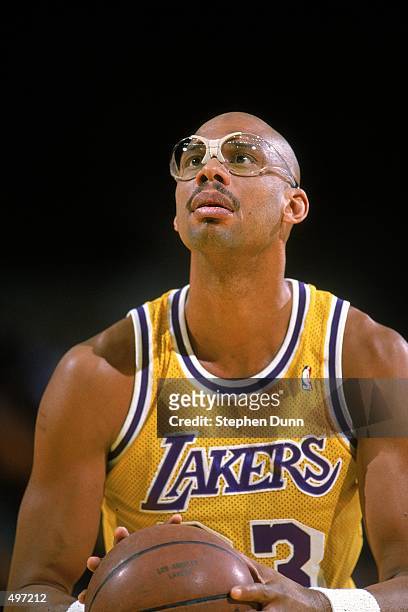Kareem Abdul- Jabbar of the Los Angeles Lakers makes a free throw during a game. Mandatory Credit: Stephen Dunn /Allsport