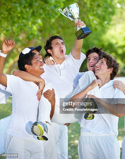 celebrating with his team - teen awards stock pictures, royalty-free photos & images