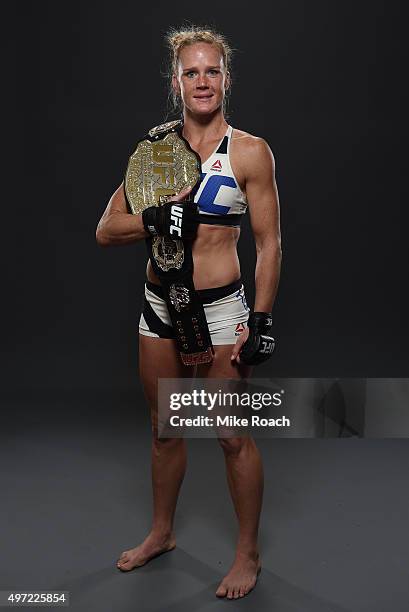 Women's bantamweight champion Holly Holm poses backstage for a post-fight portrait after the UFC 193 event at Etihad Stadium on November 15, 2015 in...