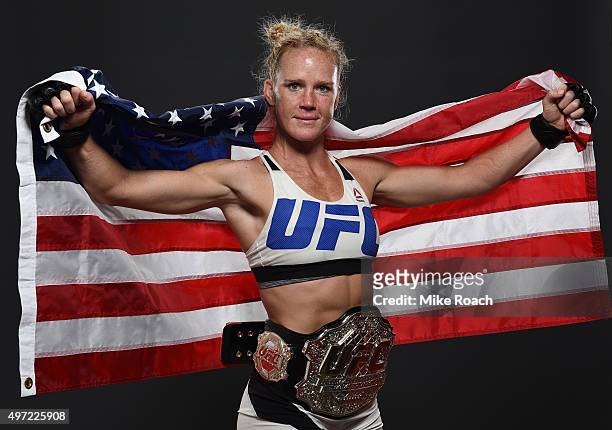 Women's bantamweight champion Holly Holm poses backstage for a post-fight portrait after the UFC 193 event at Etihad Stadium on November 15, 2015 in...
