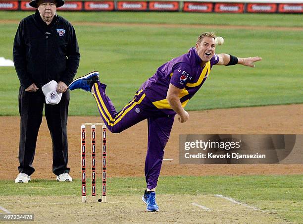 Shane's Warriors bowler Shane Warne delivers the ball to Sachin's Blasters batsman Sachin Tendulkar during the final game of a three-match three city...