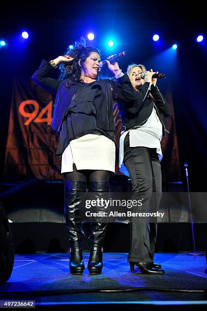 Singers Jeanette Jurado and Ann Curless of Expose perform onstage during the 94.7 The Wave Freestyle Concert at Honda Center on November 14, 2015 in...