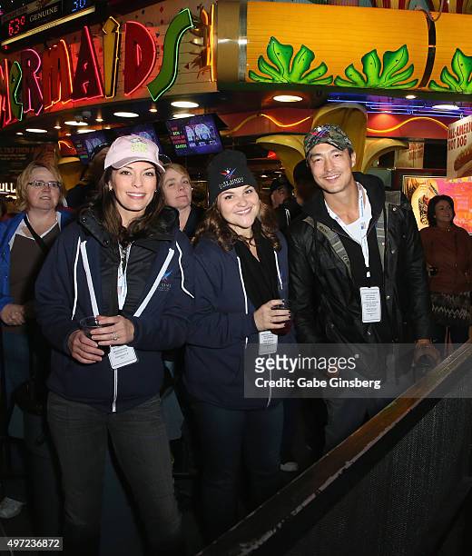 Actors Alana De La Garza, Annie Funke and Daniel Henney attend Gary Sinise & the Lt. Dan Band's Salute to the Troops Concert at the Fremont Street...