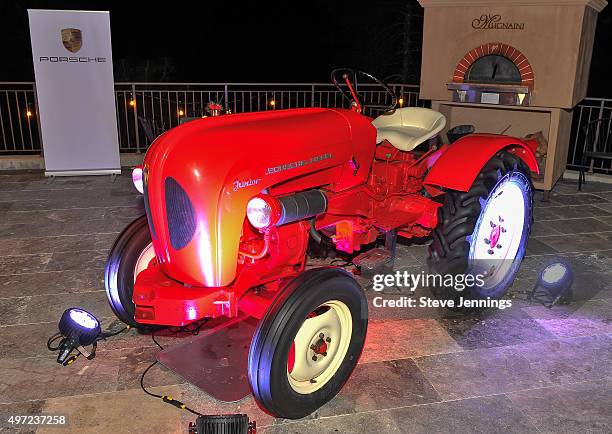 Porsche vehicles are displayed at the GRAMMY Foundation house concert featuring The Band Perry at Trattore Farms on November 14, 2015 in Geyserville,...