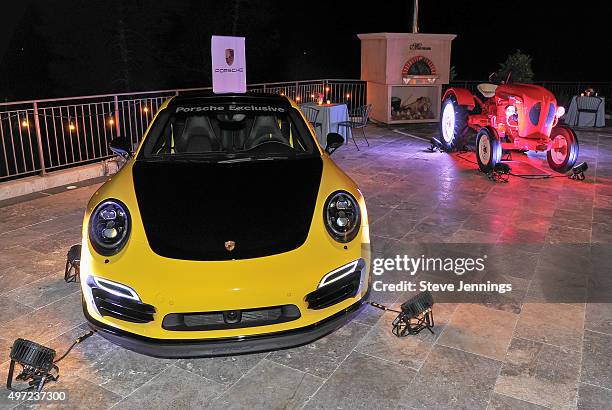 Porsche vehicles are displayed at the GRAMMY Foundation house concert featuring The Band Perry at Trattore Farms on November 14, 2015 in Geyserville,...