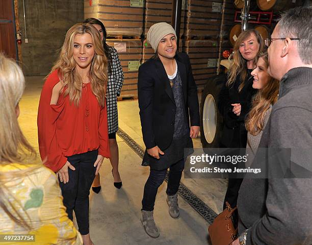 Kimberly Perry and Neil Perry of The Band Perry meet guests at the GRAMMY Foundation house concert featuring The Band Perry at Trattore Farms on...