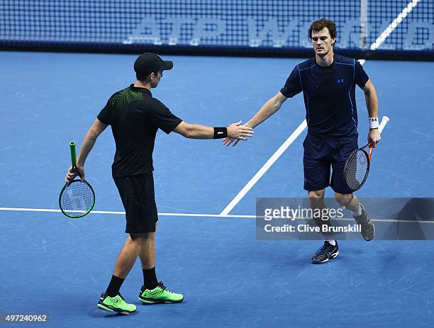 Jamie Murray of Great Britain and John Peers of Australia celebrate a point in their men's doubles match against Simone Bolelli and Fabio Fognini of...