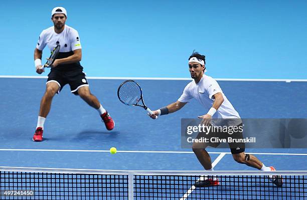 Simone Bolelli and Fabio Fognini of Italy in action in their men's doubles match against Jamie Murray of Great Britain and John Peers of Australia...