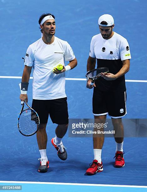 Fabio Fognini and Simone Bolelli of Italy look on in their men's doubles match against Jamie Murray of Great Britain and John Peers of Australia...