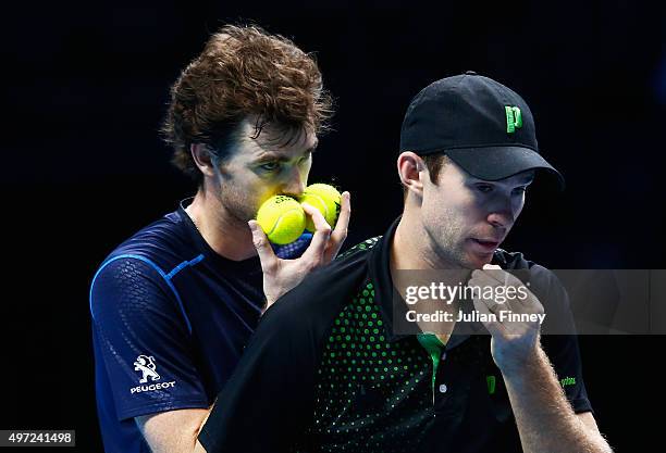 Jamie Murray of Great Britain and John Peers of Australia talk in their men's doubles match against Simone Bolelli and Fabio Fognini of Italy during...