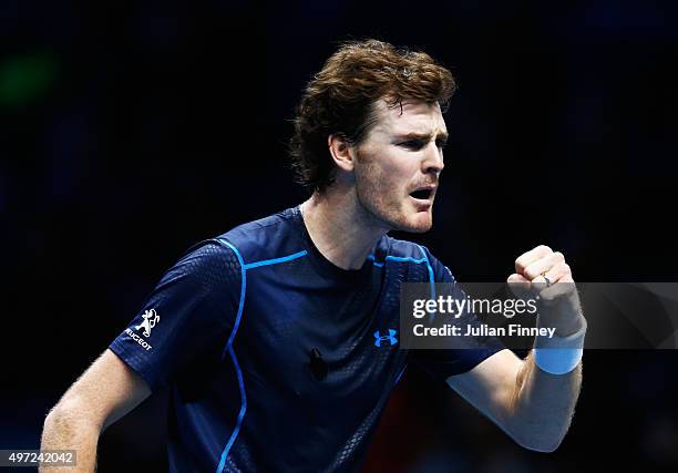 Jamie Murray of Great Britain celebrates a point partnering John Peers of Australia in their men's doubles match against Simone Bolelli and Fabio...