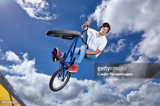 i'm gonna do a tailwhip on the next one - bicycle stunt stock pictures, royalty-free photos & images