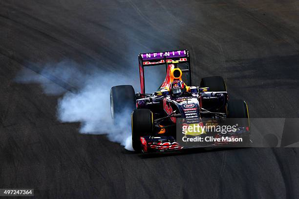 Daniil Kvyat of Russia and Infiniti Red Bull Racing locks up during the Formula One Grand Prix of Brazil at Autodromo Jose Carlos Pace on November...