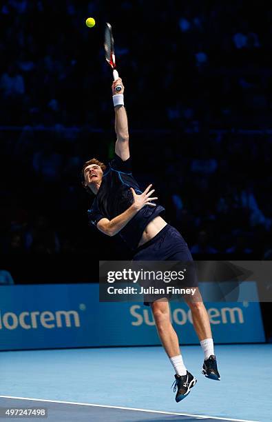 Jamie Murray of Great Britain serves partnering John Peers of Australia in their men's doubles match against Simone Bolelli and Fabio Fognini of...