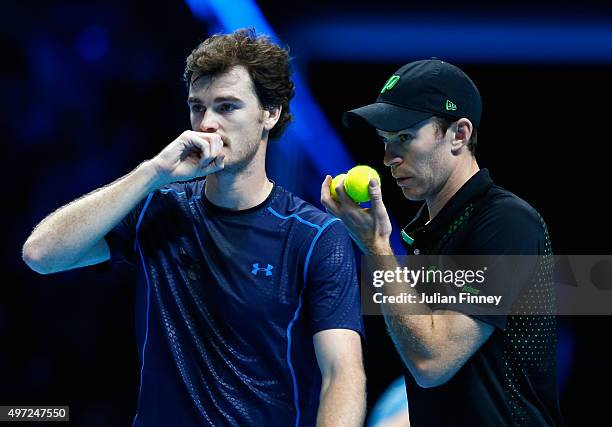 Jamie Murray of Great Britain and John Peers of Australia talk in their men's doubles match against Simone Bolelli and Fabio Fognini of Italy during...