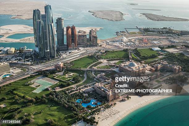 abu dhabi area viewed from the sky - abu dhabi oil stock pictures, royalty-free photos & images