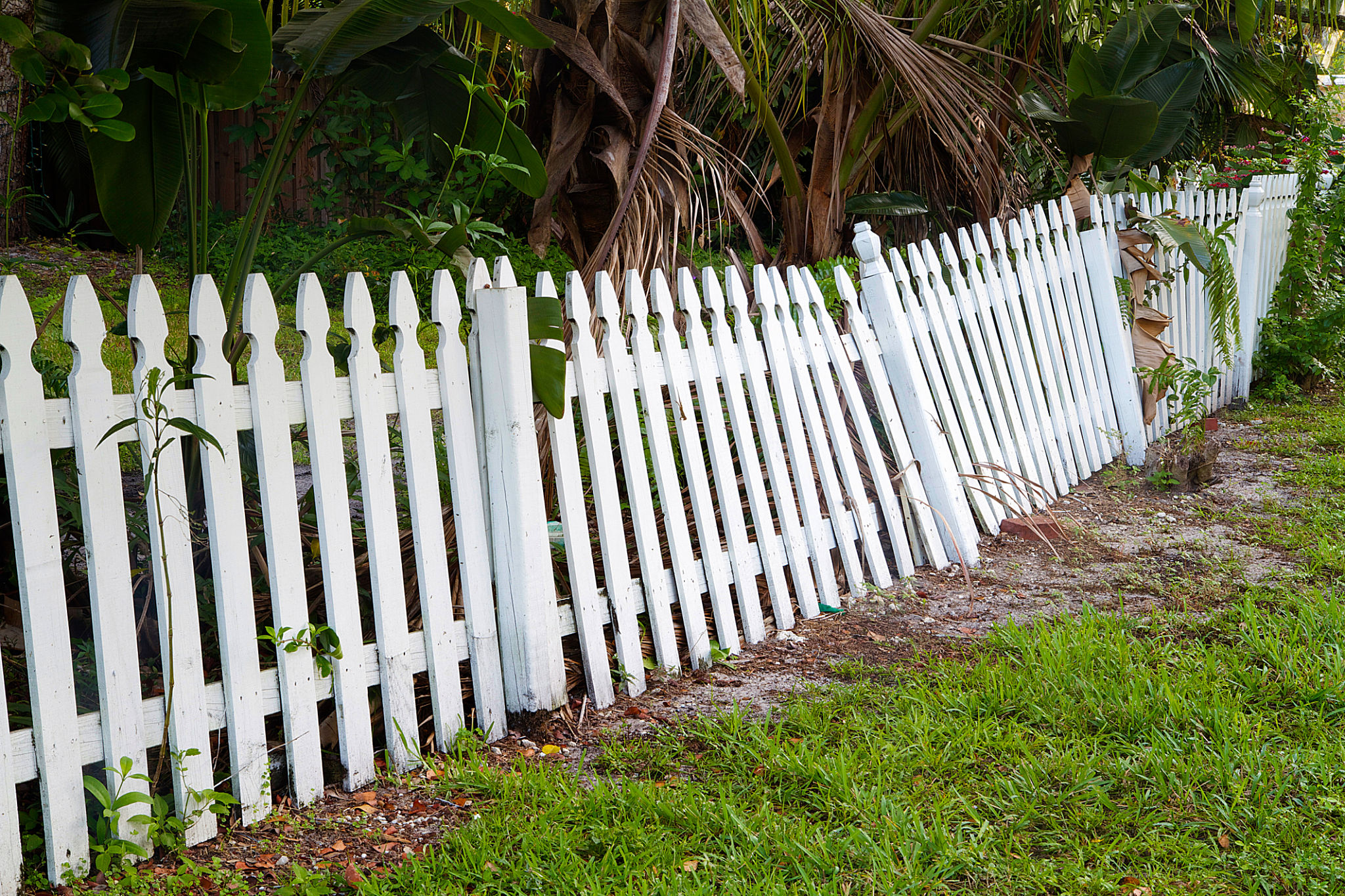 fence leaning