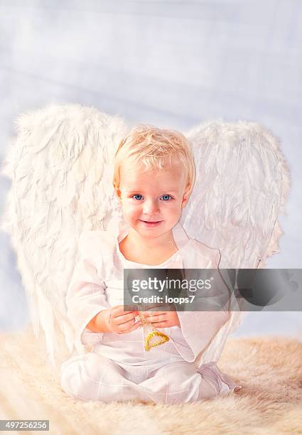 beautiful angel - baby angel wings stock pictures, royalty-free photos & images