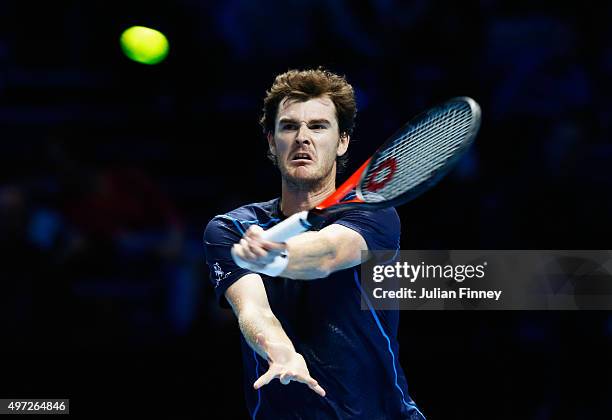 Jamie Murray of Great Britain plays a forehand partnering John Peers of Australia in their men's doubles match against Simone Bolelli and Fabio...