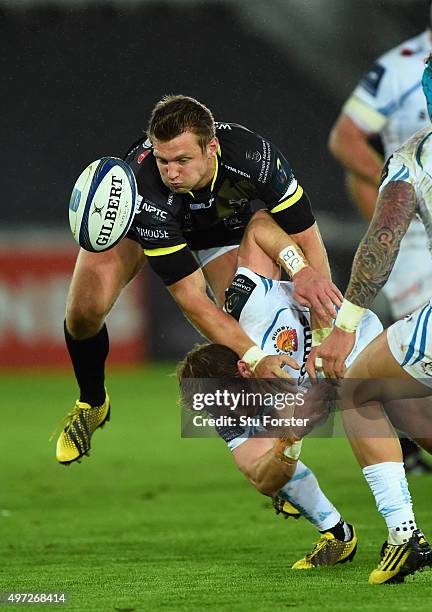 Ospreys player Dan Biggar challenges a high ball with Will Chudley of the Chiefs during the European Rugby Champions Cup Pool 2, round 1 match...