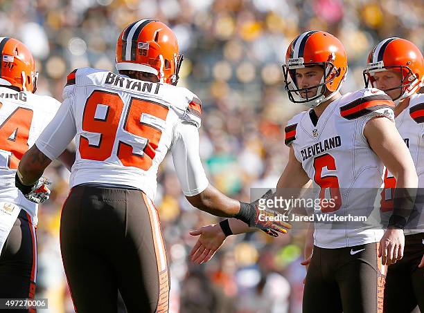 Armonty Bryant and Travis Coons of the Cleveland Browns celebrate a 1st quarter field goal made by Coons during the game against the Pittsburgh...