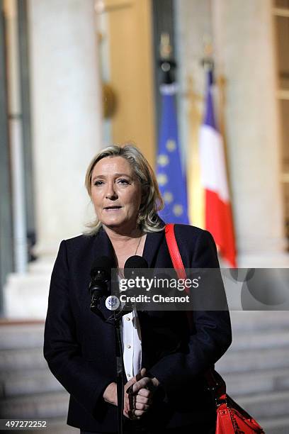 French leader of the French Far-right party Front National Marine Le Pen delivers a speech after a meeting with French President Francois Hollande at...