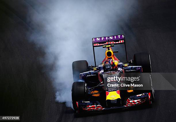 Daniil Kvyat of Russia and Infiniti Red Bull Racing locks up during the Formula One Grand Prix of Brazil at Autodromo Jose Carlos Pace on November...