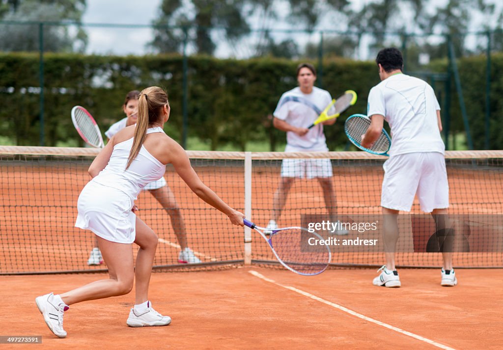 Friends playing tennis