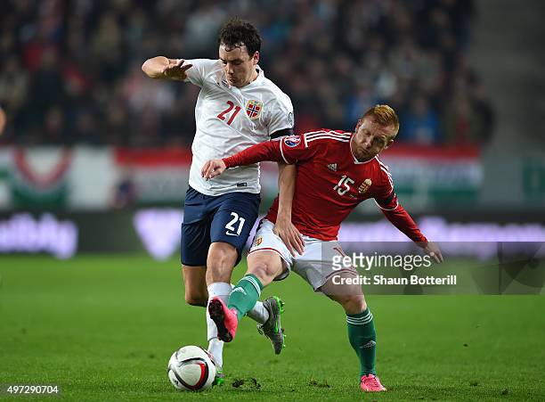 Vegard Forren of Norway and Laszlo Kleinheisler of Hungary compete for the ball during the UEFA EURO 2016 Qualifier Play-Off, second leg match...