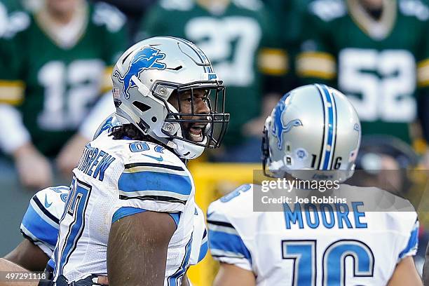 Brandon Pettigrew of the Detroit Lions reacts after scoring a touchdown in the third quarter against the Green Bay Packers at Lambeau Field on...