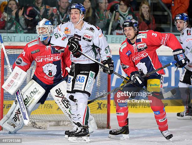 Petri Vehanen, Daniel Weiss of the Augsburger Panther and Bruno Gervais of the Eisbaeren Berlin during the game between the Augsburger Panthern and...