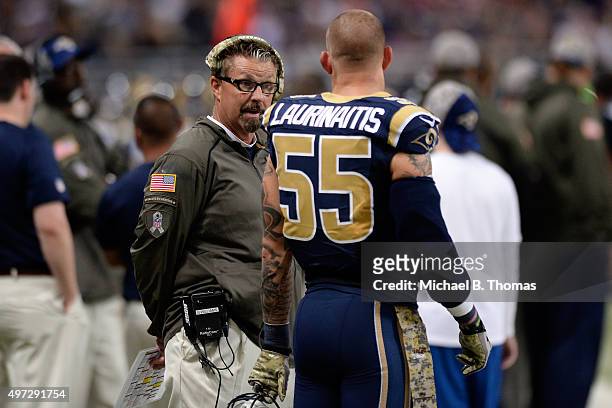St. Louis Rams defensive coordinator Gregg Williams talks with James Laurinaitis in the second quarter against the Chicago Bears at the Edward Jones...