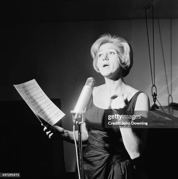 English comedy actress Liz Fraser performs a song, 17th November 1964.