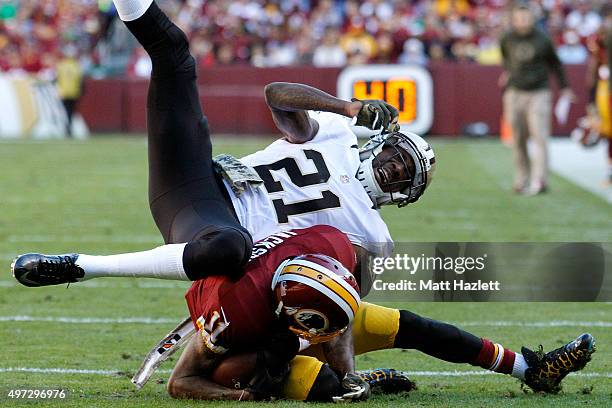 Cornerback Keenan Lewis of the New Orleans Saints collides with wide receiver DeSean Jackson of the Washington Redskins in the second quarter of a...