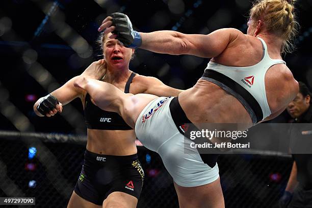 Holly Holm kicks Ronda Rousey in their UFC women's bantamweight championship bout during the UFC 193 event at Etihad Stadium on November 15, 2015 in...