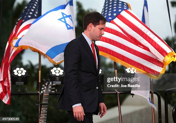 Republican presidential candidate Sen. Marco Rubio walks off stage after speaking during a community rally for "Never Again" which was bringing...