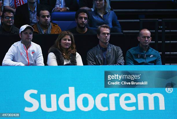Roger Federer's wife Mirka and coach Stefan Edberg watch his men's singles match against Tomas Berdych of Czech Republic during day one of the...