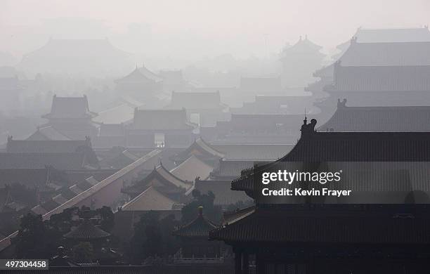 Haze from smog caused by air pollution hangs over the Forbidden City on November 15, 2015 in Beijing, China. As a result of industry, the use of...