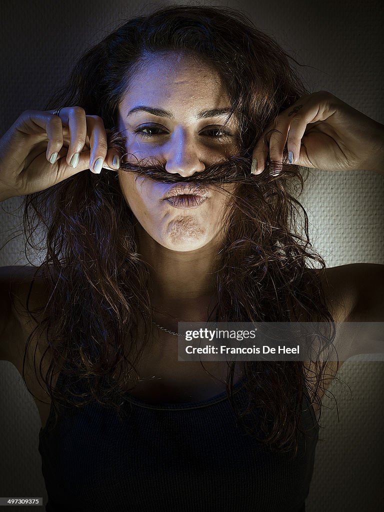 Young woman at her apartment